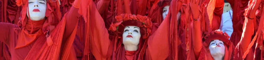 U.K. Activists Stage Mock Funeral for 1.5°C Climate Target